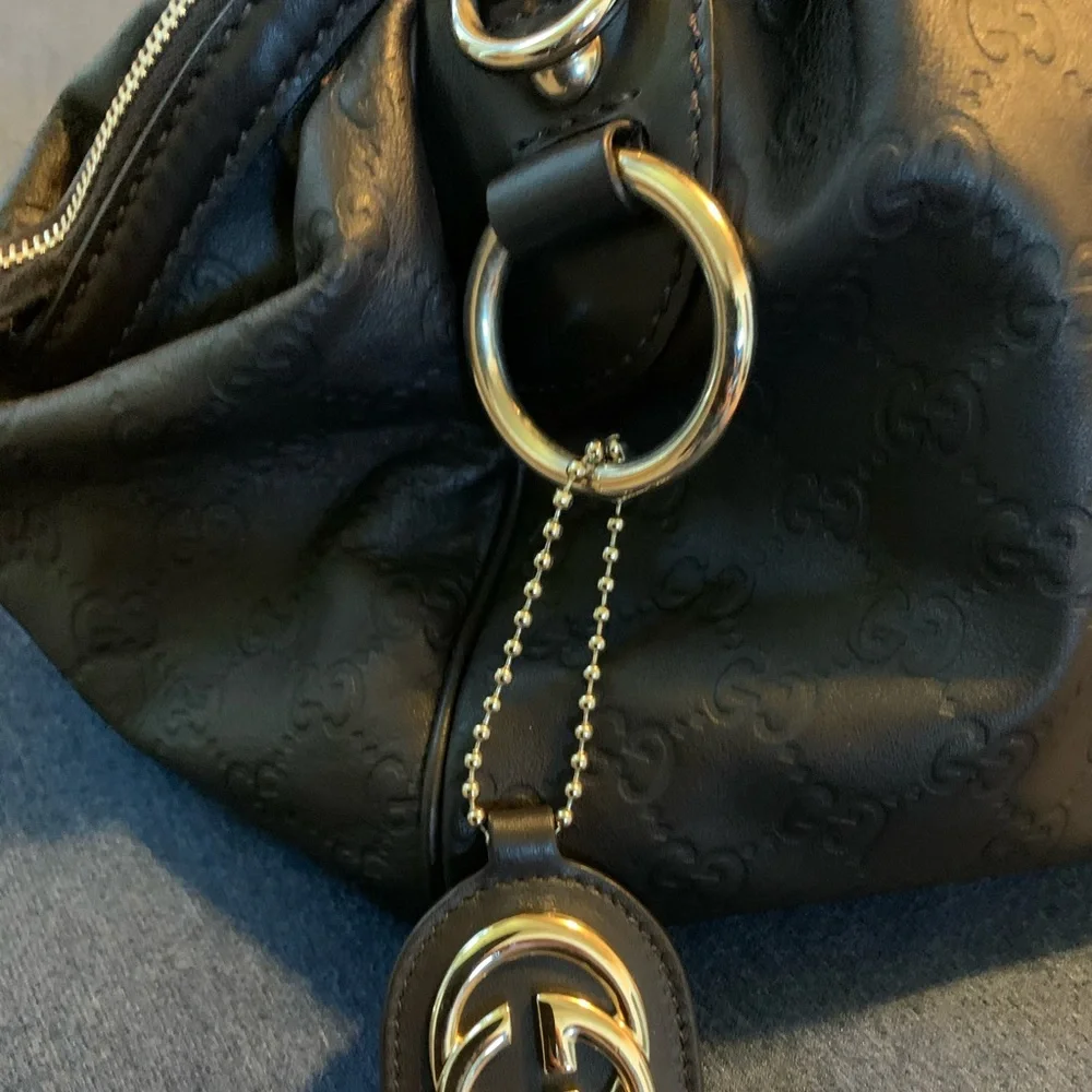 Gucci Black Embossed GG Shoulder Bag with Logo Charm